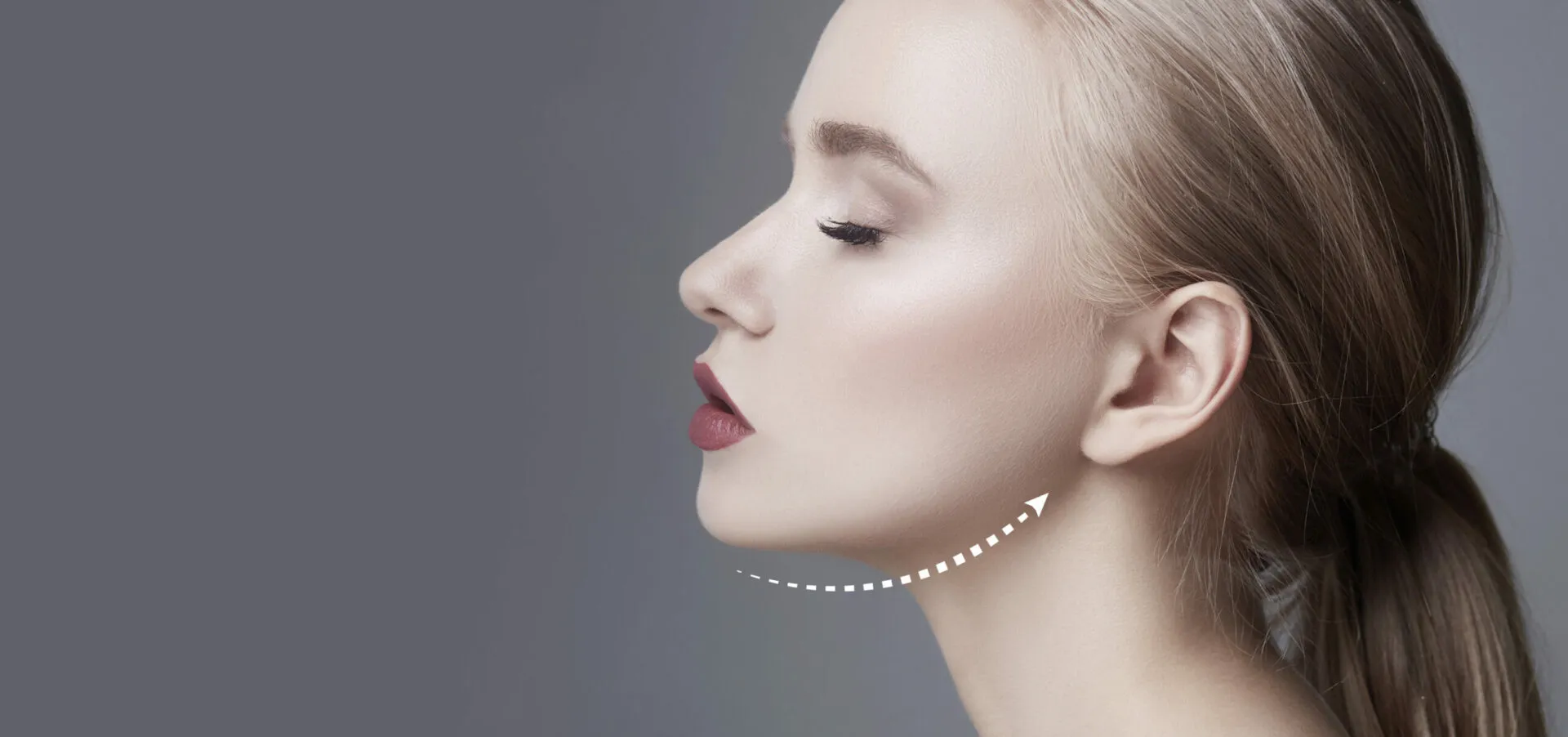 Illustrative profile highlighting the jawline and upper neck contour