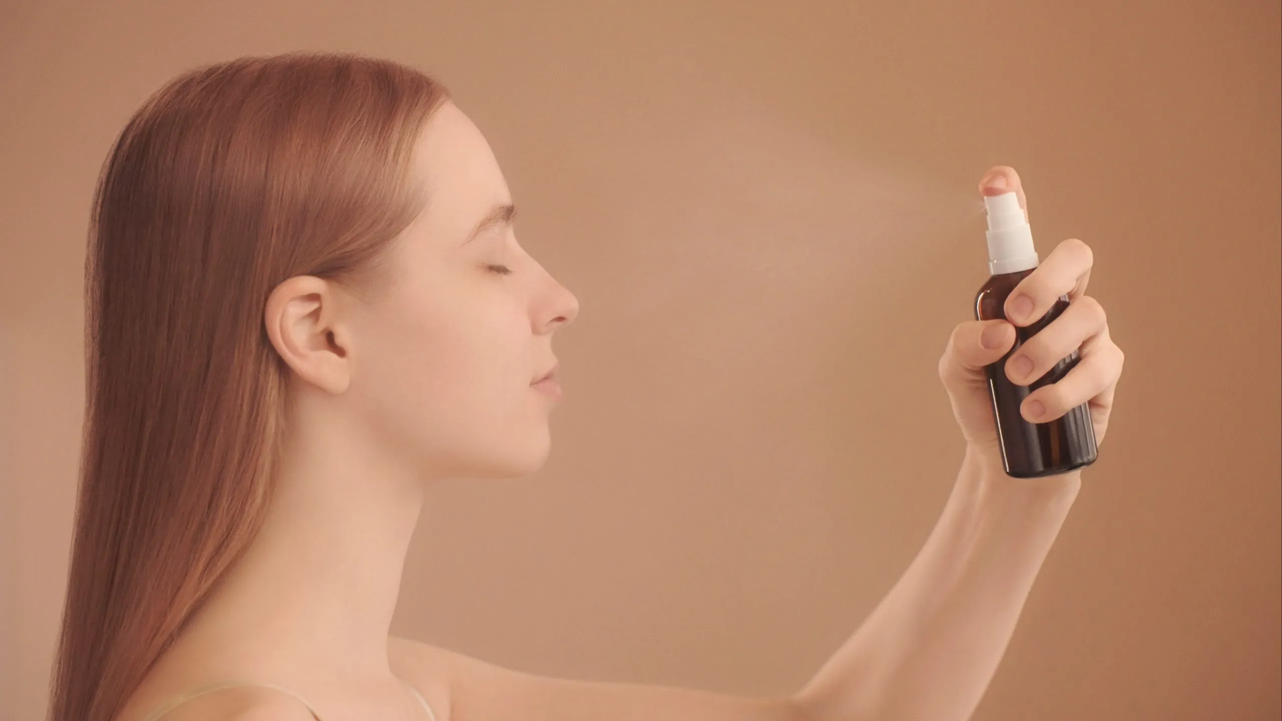 Woman caring for facial skin representing PRP facial and skin rejuvenation planning