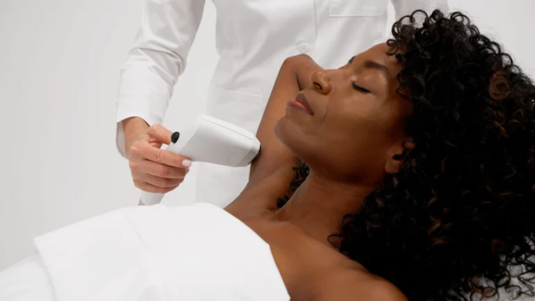 Sofwave handpiece applied to the neck in a treatment demonstration